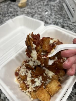 Pizza Tots Bite 😋  at The Trashy Vegan in Asheville