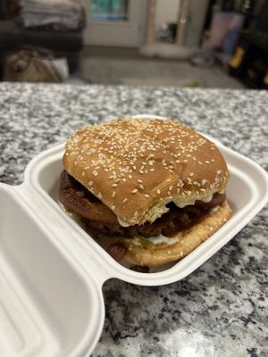 Special Burger with Fried Onions, Jalapeños, and BOMB Vegan Ranch  at The Trashy Vegan in Asheville