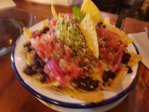 Worst quality pic of nachos you'll see today at Mad Mad Vegan - Lavapiés in Madrid