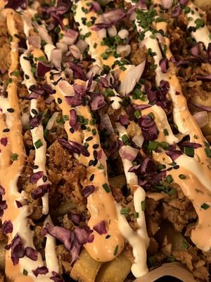 Fries with vegan meat and sauces - even picky non-vegan daughter loved!  at Mad Mad Vegan - Lavapiés in Madrid