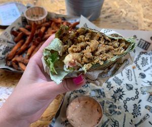 Toronto wraptor - green tortilla wrap with vegan minced meat at Mad Mad Vegan - Lavapiés in Madrid