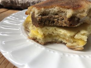Vegan Breakfast Sandwich on an English muffin, stacked with sausage, cheese, Just Egg and hash browns… WHA?!?! 💓👏🏽😘🥪💖 at Zizzo's Coffeehouse & Wine Bar in Capitola