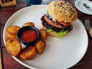 Burger and potatoes at Camu Camu cafe in Playa Del Carmen