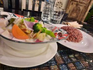 Tom Kha (coconut milk soup) w. rice at Veganecessity Cafe in Phuket