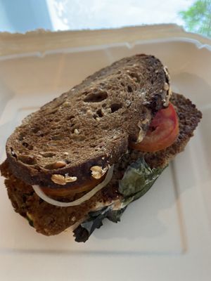 Beyond sausage sandwich! Very tasty but a little small  at Veganecessity Cafe in Phuket