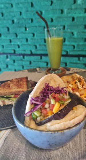 Avocado shake, pita and "egg" salad toast at Veganecessity Cafe in Phuket
