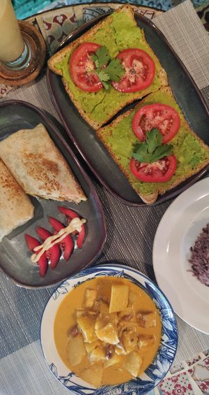 Chicken wrap, avocado toast, curry and rice at Veganecessity Cafe in Phuket