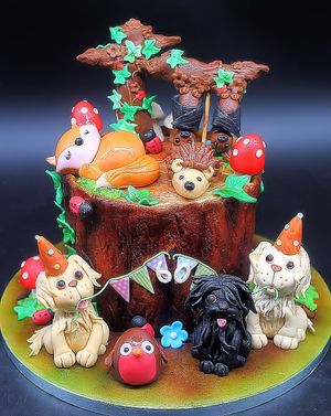 Woodland Carrot Cake with bespoke fondant decorations at Rabbit Vegan Cakes in Exeter