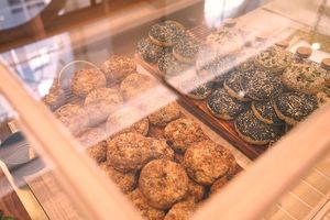 Fresh baked gluten-free, vegan buns. Orange & Spice, Sourdough & Rosemary, Seeded Savory at OM Goodness in Auckland