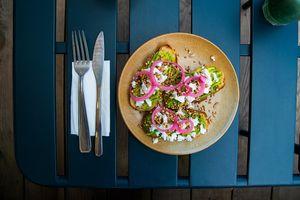 Am amazing Gluten Free dish! Tasty sourdough with avocado, vegan feta and a selection of veggies!! Highly recommend. at Maâbanana in Moliets
