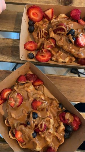 Waffles with biscoff and fruit  at Love Peace & Coffee in Edinburgh