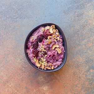 Cashew and Blackberry Porridge  at NOAMS Deli in Munich