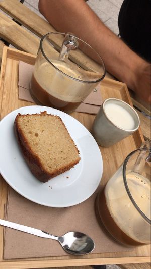 Lemon cake and oat milk coffee at Maison Watson in Angers