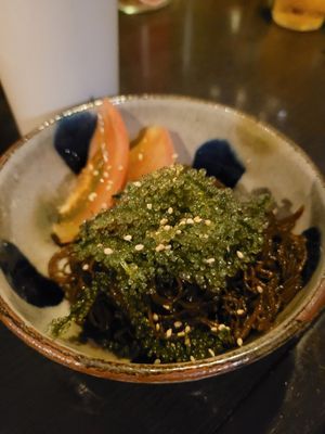 Mozuku+sea grapes in sesame oil at Tamatebako in Naha