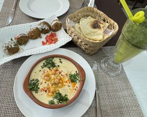 Falafel with tahini, hummus, bread and a drink.  Bread comes free.  at Sufra in Rabat
