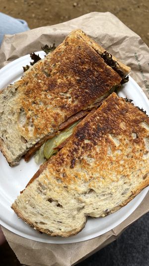 toasted vegan pepperoni, gherkins & vegan mayo sandwich  at Momo's Garden Café in London