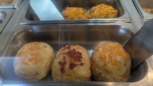 Fried potatoes stuffed with vegan cheese and vegan meat at Fela's Vegetarian Restaurant in San Juan