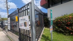The gate to walk in to get to the restaurant (if not parking) at Fela's Vegetarian Restaurant in San Juan