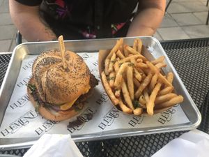 Smashed burger with side of fries at Element Gastropub in Raleigh
