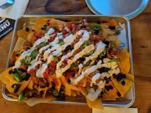 Full order of nachos with sour cream at Element Gastropub in Raleigh