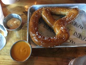 Bavarian Pretzel with Spicy German Mustard and Cashew Cheese Sauce  at Element Gastropub in Raleigh