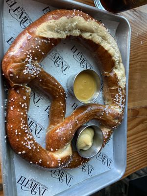 Pretzel with mustard and cheese sauces.  at Element Gastropub in Raleigh