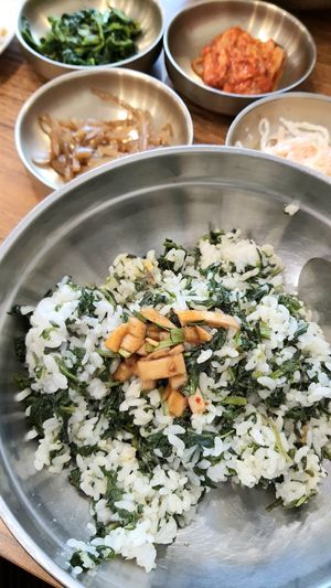 Serving of Gondeure-bap topped with seasoning sauce at Ha-u-rim 하우림 서울대점 in Seoul