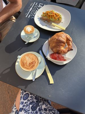 Our breakfast: ‘Greta toast’ & cortado w/ soymilk and vegan croissant & cappucino w/ soymilk  at Duzu Kafe Taberna in Durango