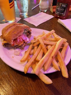 The onion ring burger. I forgot to take a picture before I smashed it to bits and took 3 bites 😂  at 2 Guys Pizza in Hendersonville