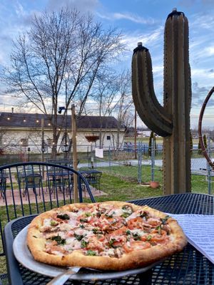 Build your own pizza with tomato slices, pepperoni and fresh basil  at 2 Guys Pizza in Hendersonville