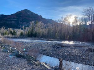 View from riverside tables at Propaganda Pie in Redstone