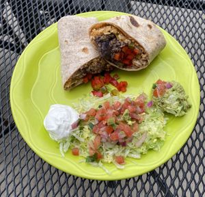 Slim Burrito made with Lard-free black beans, Mexican rice, grilled bell pepper, onion & cilantro rolled into a freshly made, lard-free, flour tortilla.  Side of sour cream option at Don Juanz - Baja Beach Tacos  in Shreveport