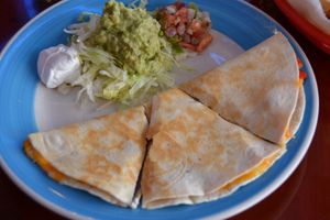 Veggie Quesadilla.  Monterrey jack and cheddar cheese with grilled bell pepper & onion.  Side of freshly made guacamole. at Don Juanz - Baja Beach Tacos  in Shreveport