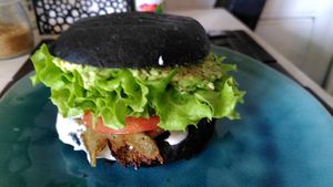 Seitan burger with abundant mayo and avocado at Maranta in Pucon