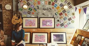 Artist Claudia Bowler showing her ‘Bigger Picture’ can art print in the Taphouse. at Brass Castle Brewery in Malton