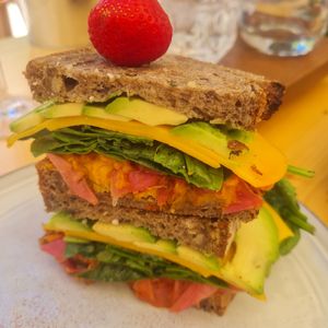 Vegan sandwich with vg cheese and kimchi at Nibs Healthy Bar in Menorca