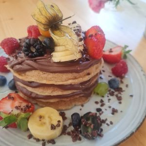 Vegan pancakes with vego spread at Nibs Healthy Bar in Menorca