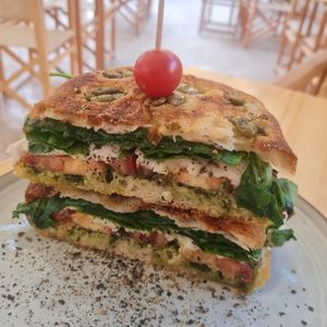 Vegan sandwich with foccacia, vegan mozzarella and pesto at Nibs Healthy Bar in Menorca