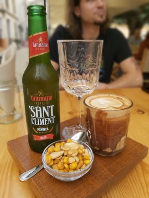 Vegan Nutelino and local beer at Nibs Healthy Bar in Menorca