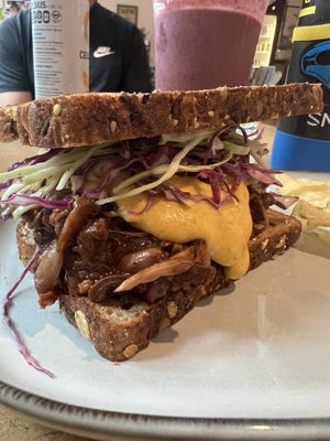 BBQ jackfruit sandwich closeup   at Real Roots Cafe in Chattanooga