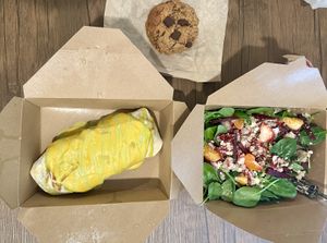 Smothered Burrito, Beet Salad, Health Cookie. (We ordered to-go.  That’s why the food is in the containers)    at Real Roots Cafe in Chattanooga