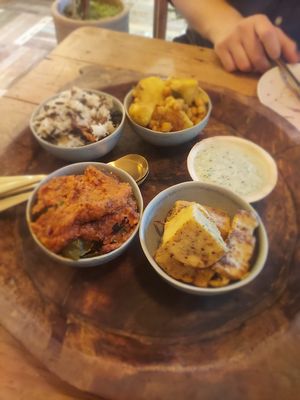 Main course, curries, vine leaves, polenta, wild rice. at Dane & Port - Natural Kitchen in Bournemouth