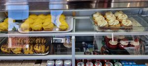 Select of cakes and muffins on offer at Los Navegantes del Magallanes in Puerto Natales