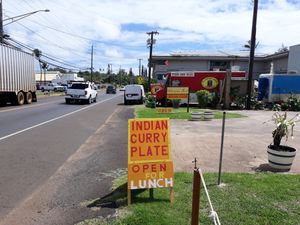 Road signs  at Cafe Nirvana in Kapaa