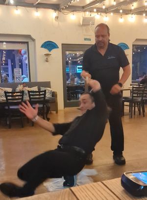 The owner dancing! at The Greek in Ventura