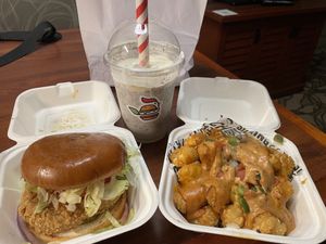 Original project chik’n sandwich, loaded tater tots, and cookies-n-cream oat shake  at Project Pollo - Crownhill in San Antonio