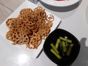 Fried lotus root, pickled asparagus at Woka Woka in Sunnybank