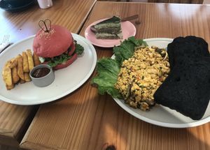 Tofu scramble sandwich and black bean quinoa burger  at iVegan Supershop Da Nang - Healthy Plant Based Cafe in Da Nang