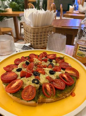 pesto pizza with cheese made by cashew at iVegan Supershop Da Nang - Healthy Plant Based Cafe in Da Nang