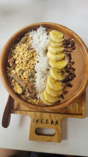 Banana and cacao smoothie bowl at iVegan Supershop Da Nang - Healthy Plant Based Cafe in Da Nang